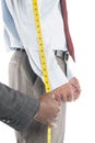 Tailor measuring shirt's sleeve