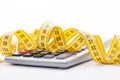 Tailor measuring tape and calculator Royalty Free Stock Photo