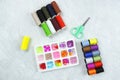 Tailor needles and threads and decorative elements, beads for children`s creativity, for embroidery, making bracelets and other j