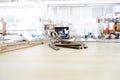 Tailor`s tools, old scissors, wooden meter and ruler on the sartorial work table