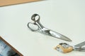 Tailor's work desk with sewing tools close up photo