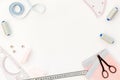 Tailor shop with thread, scissors, fabric. Sewing as hobby. White background top view mockup Royalty Free Stock Photo