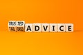 Tailored or trusted advice symbol. Concept words Tailored advice and Trusted advice on wooden cubes. Beautiful orange table orange