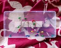 Tailoring Pins in a Transparent Plastic Box Royalty Free Stock Photo