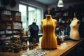 A tailors dummy adorned with measuring tapes in a bustling fashion studio