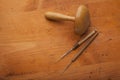 Tailors tools, darning-ball crochet on wooden texture