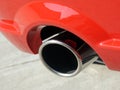 Tailpipe on new red sports car Royalty Free Stock Photo