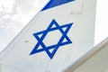 Tailplane of an airplane with a drawing of the Israeli flag Royalty Free Stock Photo