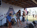 Taimane and band playing at Hawaii Polo Club