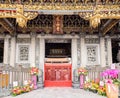 Daytime shot of many people visiting Lungshan Temple