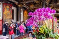 Daytime shot of many people visiting Lungshan Temple