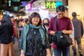 TAIPEI, TAIWAN - JANUARY 05: Unnamed elderly woman happily walks in the Shilin night market in Taipei on January 05, 2020