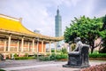 Statue of Sun Yat-sen at the National Sun Yat-sen Memorial Hall, with view of Taipei 101 building in background Royalty Free Stock Photo