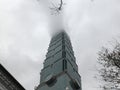 Taipei 101 tower building with heavy fog