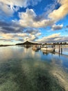 Tairua Pier, Coromandel, New Zealand - Feb 02 2024: Scenic beauty of Tairua Pier with boats along Coromandel, New Zealand