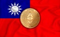 Taiwan flag ethereum gold coin on flag background. The concept of blockchain bitcoin currency decentralization in the country.