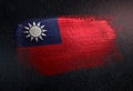 Taiwan Flag Made of Metallic Brush Paint on Grunge Dark Wall