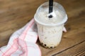 Taiwan milk tea - Bubble milk tea in glass on the wooden table Royalty Free Stock Photo