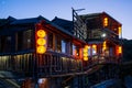 A night scene of teahouse buildings decorate with orange Chinese style lantern at Juifen Village Royalty Free Stock Photo