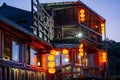 A night scene of teahouse buildings decorate with orange Chinese style lantern at Juifen Village Royalty Free Stock Photo