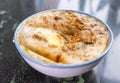 Taiwan`s distinctive famous snacks: Savory rice pudding Wa gui in a white bowl on stone table, Taiwan Delicacies