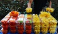 Taiwan street food including Persimmon fresh papaya in plastic box ready for sale. Selective focus Royalty Free Stock Photo