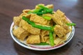 Taiwan traditional stir-fried tofu skin (bean curd sheet) Taiwanese food on wood table at restaurant