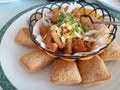 Taiwan'food : Batter fried squid with corn flakes and onion around fried taro