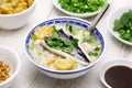 Taiwanese congee with milkfish belly and milkfish balls.