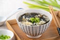 Taiwanese food - Homemade delicious seaweed egg drop soup in a bowl on a serving tray