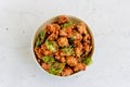 Taiwanese Fried Chicken in a Bowl with Basil Leaves and Seasonings Top Down Photo