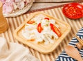 Taiwanese Kimchi in a wooden dish with spoon and chopsticks isolated on mat side view on wooden table taiwan food Royalty Free Stock Photo