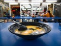 Taiwanese pork bone broth Ramen Noodle Soup on blue table