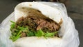 Taiwanese Pork Steamed Sandwich bun (gua bao) at food street market
