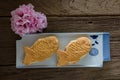 Taiyaki cakes on wood background,Japanese confectionery