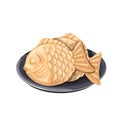 Taiyaki, Japanese cake of fish shape, sweet pancakes with bean paste, biscuits on plate