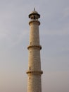 One of the four minarets of the Taj Mahal white marble mausoleum Royalty Free Stock Photo