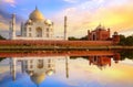 Taj Mahal Agra at sunset with water reflection and moody sky Royalty Free Stock Photo