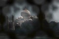 Taj Mahal as seen through the stone screen from Agra Fort