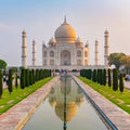 Taj Mahal front view reflected on the reflection pool.