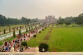 Taj Mahal gardens with fountains,on background the main gateway (darwaza), Agra, Uttar Pradesh, India