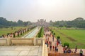 Taj Mahal gardens with fountains,on background the main gateway (darwaza), Agra, Uttar Pradesh, India