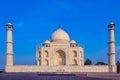 Taj Mahal in India under blue sky with the inscription of the coran in arabic letter meaning in english: This is an invitation to