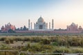 Taj Mahal and outlying buildings as seen from across the Yamuna