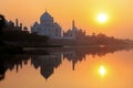 Taj Mahal reflected in Yamuna river at sunset in Agra, India Royalty Free Stock Photo