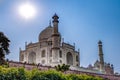 Taj Mahal in sun light. Early in the morning, back view behind the fence, from outside, river side. One of the most Royalty Free Stock Photo