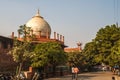 Taj Mahal in sun light. Early in the morning, back view behind the fence, from outside, street side. One of the most