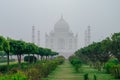 Taj Mahal view in morning fog from across the Mehtab Bagh or The Royalty Free Stock Photo