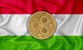 Tajikistan flag, ripple gold coin on flag background. The concept of blockchain, bitcoin, currency decentralization in the country