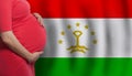 Tajikistani pregnant woman belly on flag of Tajikistan background